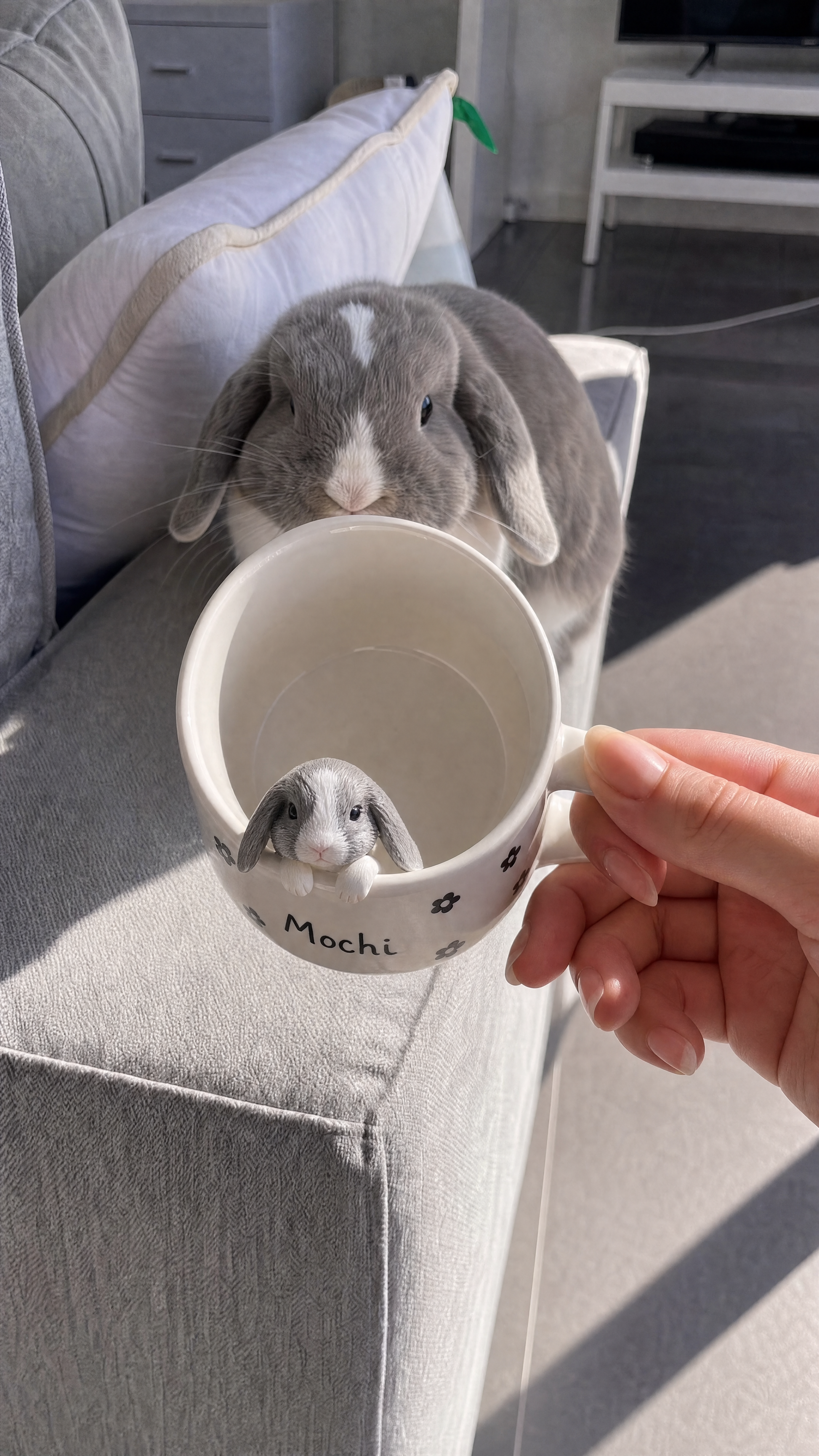 Mochi bunny mug tilted to show the figurine inside